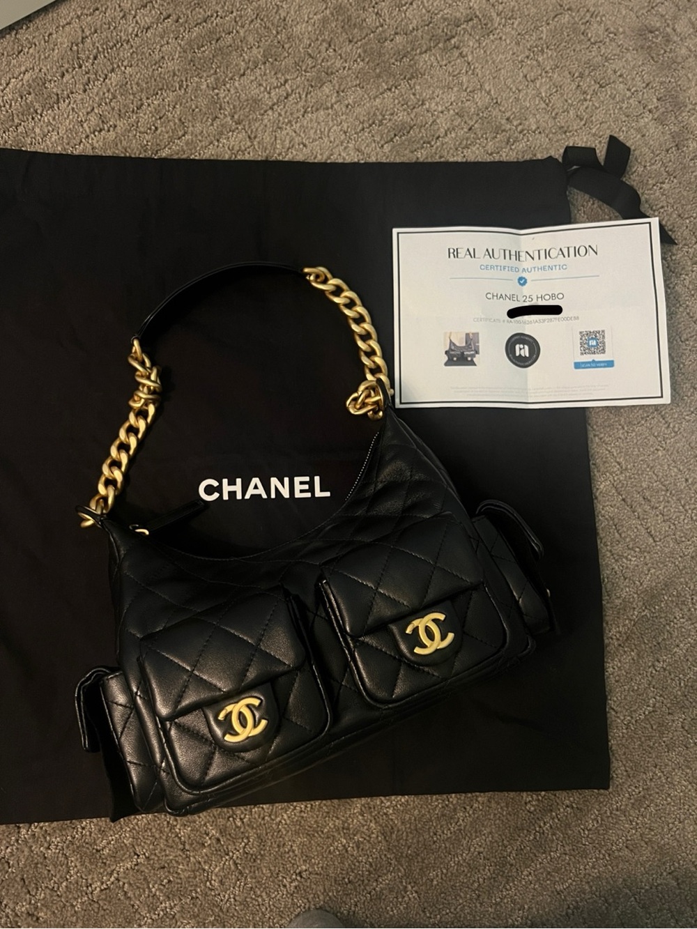 CHANEL Black Quilted Leather Hobo Bag with Gold Chain